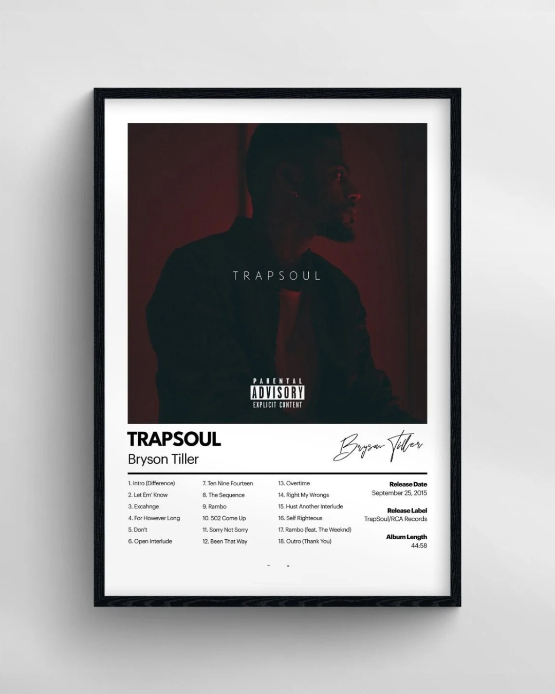 Framed album cover for 'Trapsoul' by Bryson Tiller with a silhouette of the artist on a red background.