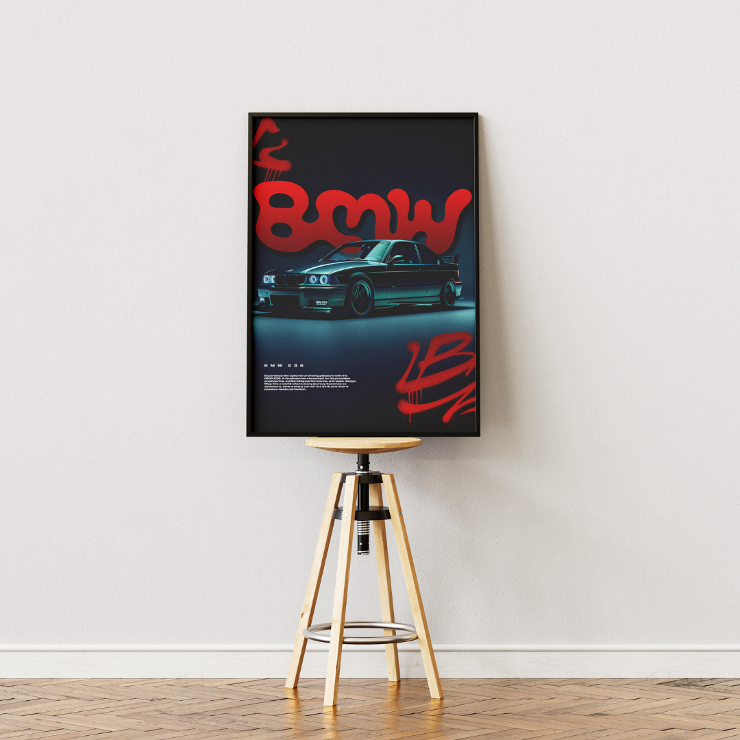 Framed poster with BMW logo and car image on a white wall.
