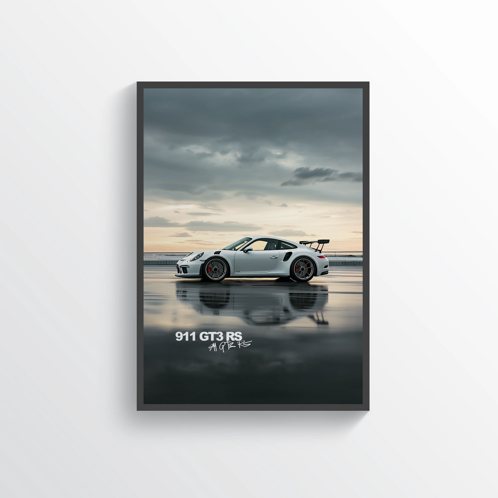 Framed poster of a Porsche 911 GT3 RS on a beach with a stormy sky.